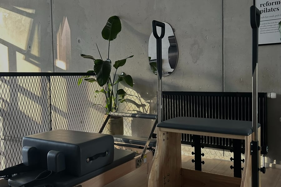 Sunlight falling across a Reformer and Wunda chair in the Align Atelier studio